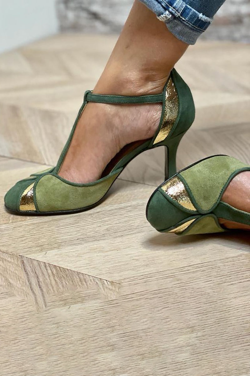 Striking Confidence in Green Heels